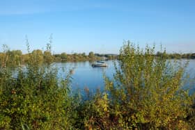 A boy, 17, has reportedly gone missing in the lake at Fairlop Waters, Redbridge. Credit: Adobe Stock