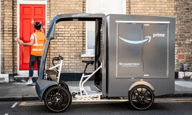 Amazon is introducing a fleet of e-cargo bikes and a team of on-foot delivery staff to replace thousands of van deliveries in London.