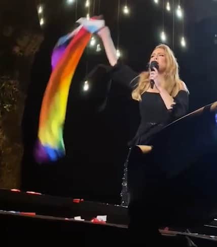 Adele with Dean’s £8 Pride flag. Credit: Dean Barber