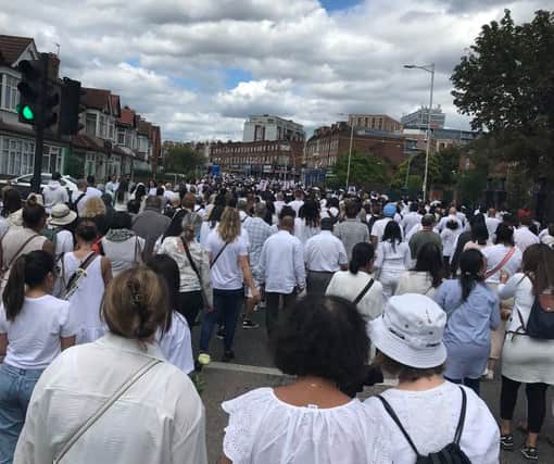 Mourners walked Cranbrook Road in Ilford. Photo: Catriona Martin