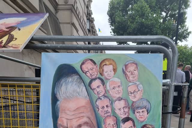 Artist Kaya Mar says he has left space on his portrait of the Queen and all her prime ministers for Boris Johnson’s successor. Photo: LW