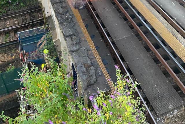 Trains at Victoria Station are expected to be delayed after a fire broke out by the train tracks. Photo: Steve White