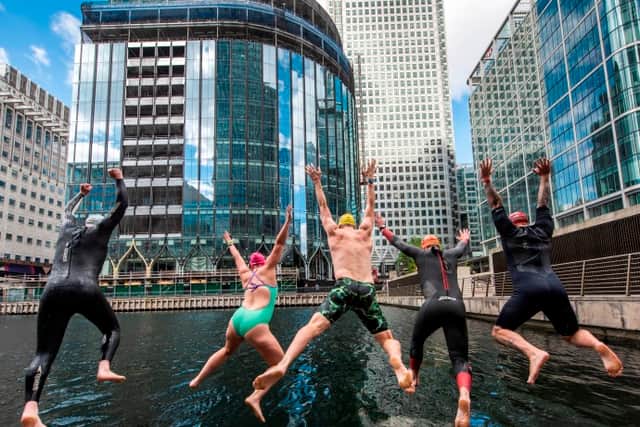 Swimmers enjoying the new open water venue at Middle Dock, Canary Wharf. Photo: Canary Wharf Group