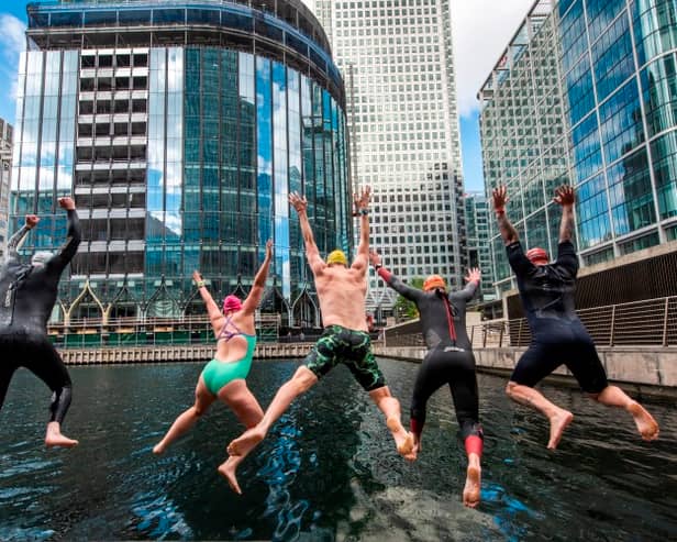 Swimmers enjoying the new open water venue at Middle Dock, Canary Wharf. Photo: Canary Wharf Group