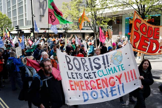 Climate protestors highlighting the fossil fuel economy. Photo: Getty