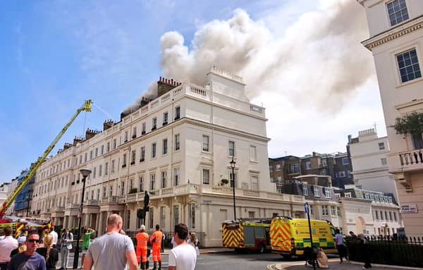 Dozens of firefighters are battling a blaze near a star-studded Belgravia square. Photo: Ames Belgravia