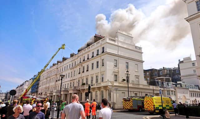 Dozens of firefighters are battling a blaze near a star-studded Belgravia square. Photo: Ames Belgravia