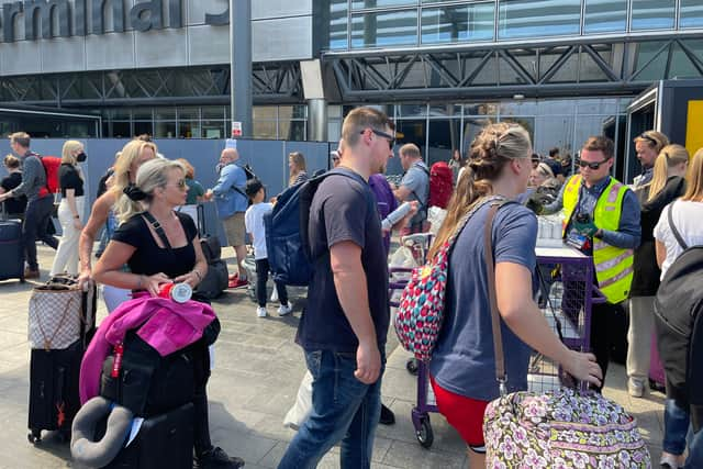 Queues outside Heathrow. Photo: David Brackin