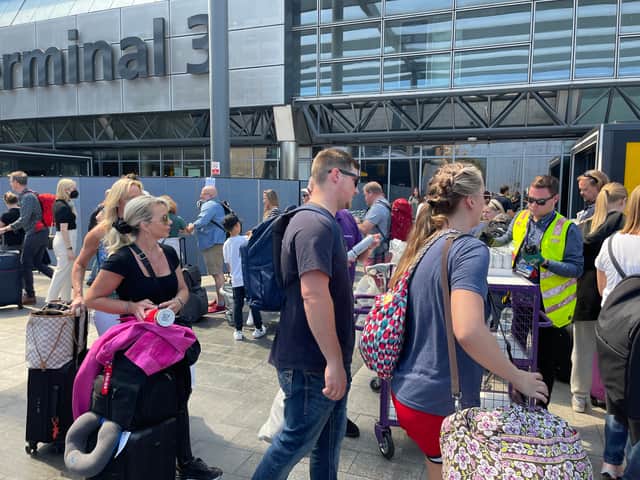 Queues outside Heathrow. Photo: David Brackin