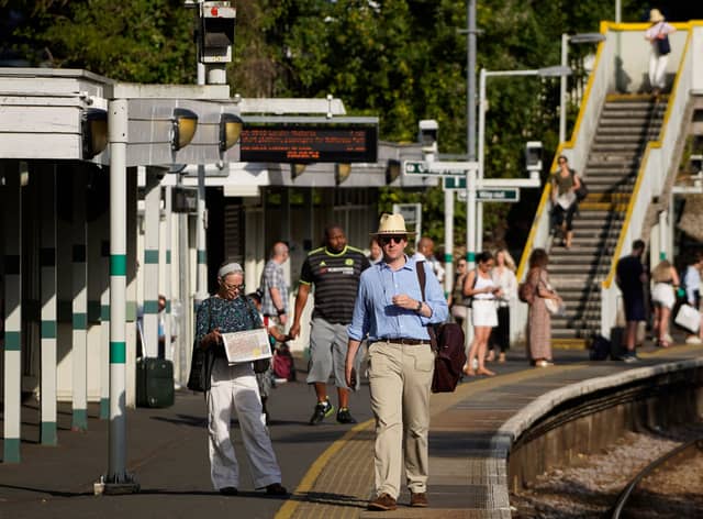 Six Tube lines along with the Elizabeth line, the London Overground and the Tram are delayed or suspended due to the extreme heatwave as of 9am on Tuesday, July 19. Pictured, commuters at South Norwood station. Photo: Getty