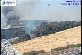 A Highways England image of the fire in Pea Lane, Upminster, from the M25. Credit: Highways England