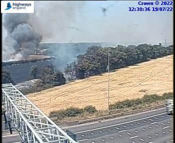 A Highways England image of the fire in Pea Lane, Upminster, from the M25. Credit: Highways England