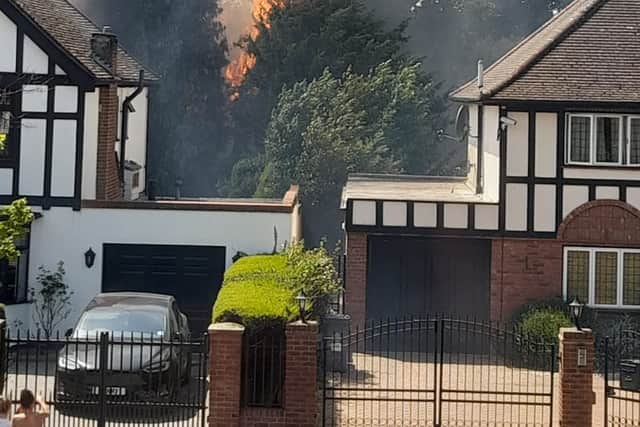 A fire has broken out along the railway tracks at Hatch End station in northwest London. Photo: Matthew Goodwin-Freeman