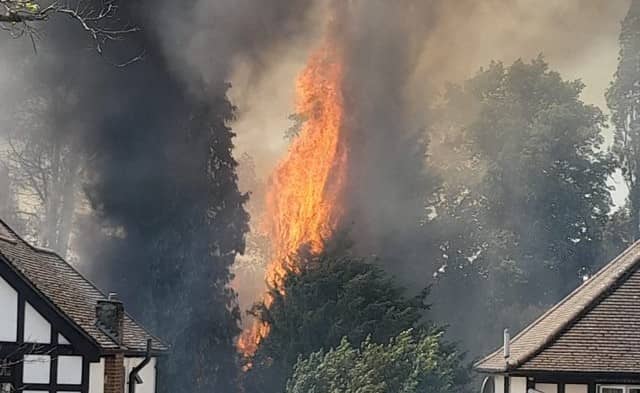 A fire has broken out along the railway tracks at Hatch End station in northwest London. Photo: Matthew Goodwin-Freeman