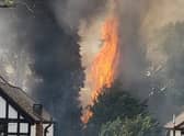 A fire has broken out along the railway tracks at Hatch End station in northwest London. Photo: Matthew Goodwin-Freeman