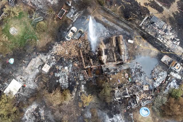 A drone shot of the rubble and destruction in Wennington, Havering, from a huge grass fire yesterday. Credit: Leon Neal/Getty Images