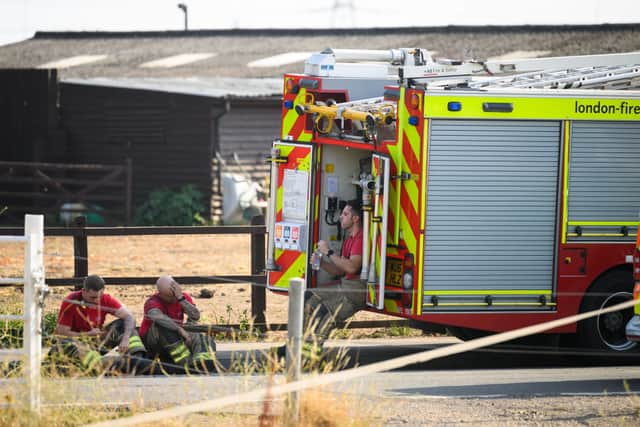 A huge fire broke out and engulfed homes in Wennington as 100 firefighters battled the flames.