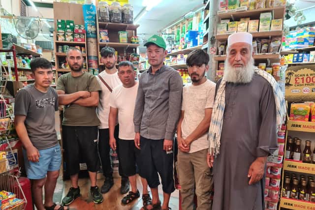 Devastated Brixton Market stall owners have been left without their livelihoods. Photo: Saja Shaheen