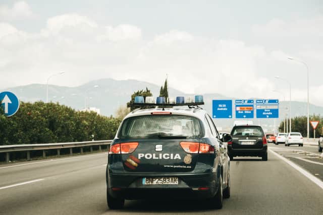 Spanish police can fine you if you’re using headphones or a Bluetooth headset while driving (Photo: Shutterstock)