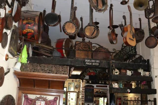 Instruments hang down at the Troubadour. Credit: Claudia Marquis