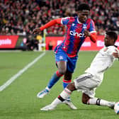  Malcolm Ebiowei (L) is tackled by Manchester United player Luke Shaw during the pre-season  (Photo by WILLIAM WEST/AFP via Getty Images)