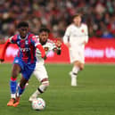 Jesurun Rak-Sakyi of Crystal Palace runs with the ball during the Pre-Season Friendly match  (Photo by Graham Denholm/Getty Images)