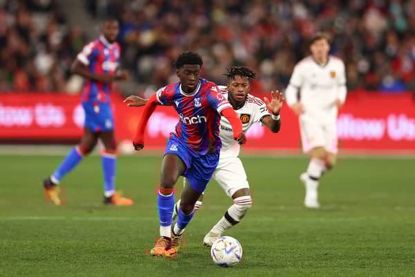 Jesurun Rak-Sakyi of Crystal Palace runs with the ball during the Pre-Season Friendly match  (Photo by Graham Denholm/Getty Images)