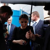 Marina Granovskaia (C) and Chelsea’s US chairman Bruce Buck (back L) are surrounded by media as they leave (Photo credit should read ADRIAN DENNIS/AFP via Getty Images)