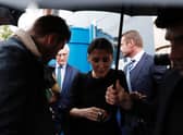 Marina Granovskaia (C) and Chelsea’s US chairman Bruce Buck (back L) are surrounded by media as they leave (Photo credit should read ADRIAN DENNIS/AFP via Getty Images)