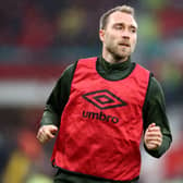 Christian Eriksen of Brentford warms up prior to kick off of the Premier League match  (Photo by Naomi Baker/Getty Images)
