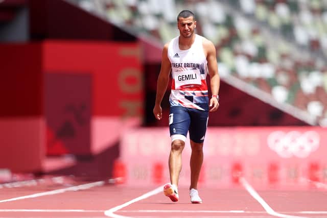 Adam Gemili of Team Great Britain walks during round one of the Men's 200m heats after an apparent injury on day eleven of the Tokyo 2020 Olympic Games at Olympic Stadium on August 03, 2021 in Tokyo, Japan.