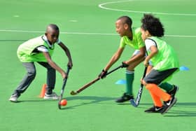 Children trying out hockey in Redbridge. Credit: Redbridge Council
