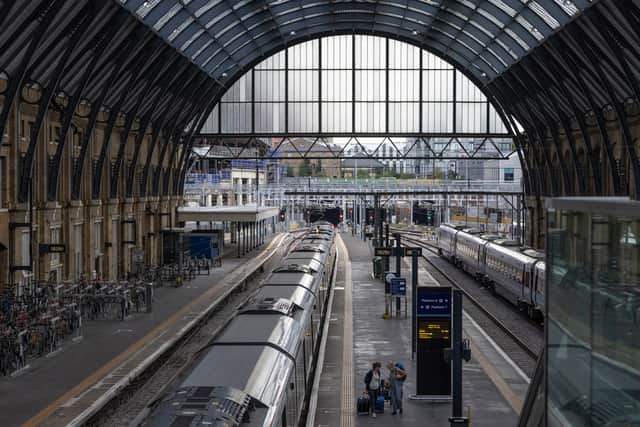 JULY 27: Passengers walk through a quiet King’s Cross station on July 27, 2022 in London, United Kingdom. 40,000 RMT rail workers will walk out for the second round of train strikes today.