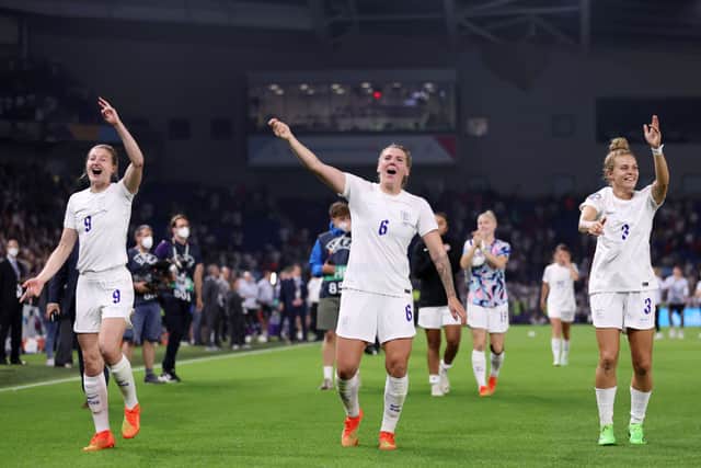 Ellen White, Millie Bright and Rachel Daly celebrate a 2-1 victory over Spain in the quarter finals at Brighton