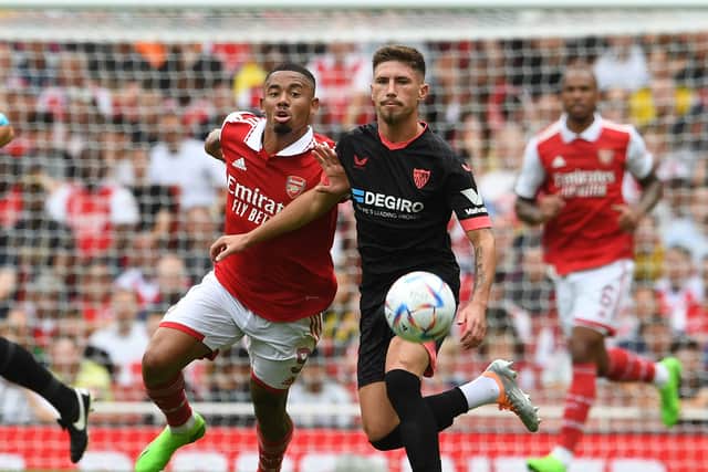Gabriel Jesus of Arsenal is challenged by Jose Angel of Sevilla during the Emirates Cup match  (Photo by David Price/Arsenal FC via Getty Images)