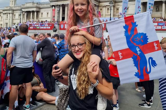 While fellow football fans Ellie Robinson, 31, and daughter Bonnie, six, said the result was “history making”. Credit: LW