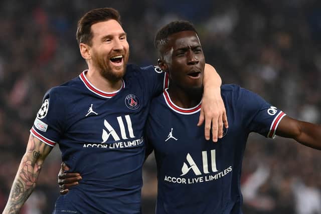 Idrissa Gueye celebrates scoring for PSG with Lionel Messi. Picture:  FRANCK FIFE/AFP via Getty Images