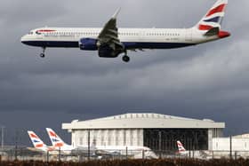 A British Airways plane flying over London Heathrow Airport. Photo: AFP via Getty Images