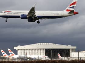A British Airways plane flying over London Heathrow Airport. Photo: AFP via Getty Images