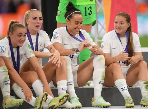 <p>England players soak up the moment after being crowned Euro 2022 champions. Photo: Harriet Lander/Getty Images</p>