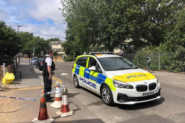 Police outside the house in Derby Road, Croydon, in the search for Owami Davies. Credit: LW