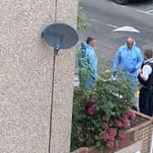 Police outside the house in Derby Road, Croydon, during a dawn raid in the search for missing student nurse Owami Davies. Credit: Iman Salah