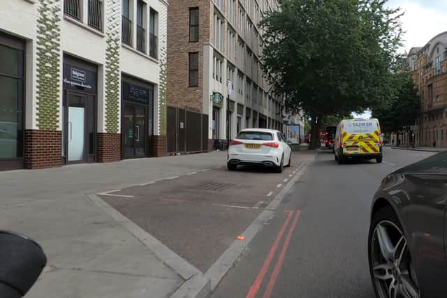 A cyclist launched a foul-mouthed tirade against a driver who suddenly pulled in on a road in central London causing a minor collision. Credit: SWNS