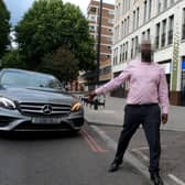 GoPro footage of close call with cyclist and driver in central London. Credit: SWNS