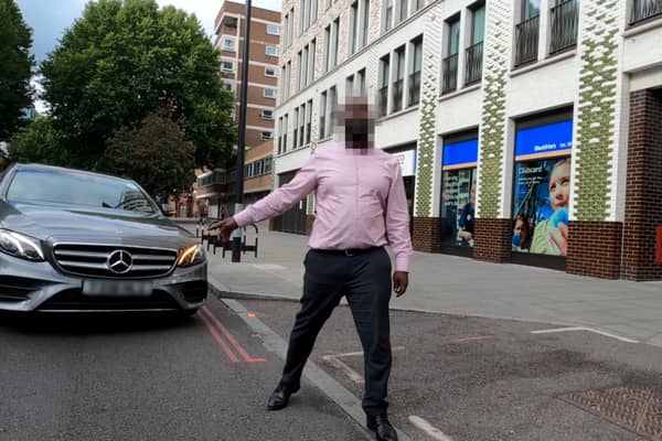 GoPro footage of close call with cyclist and driver in central London. Credit: SWNS