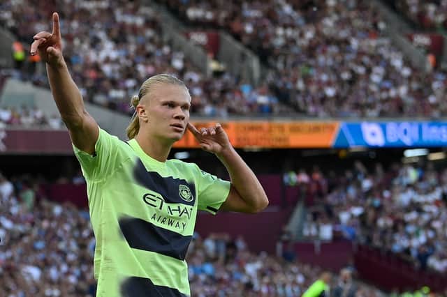 Manchester City’s Norwegian striker Erling Haaland celebrates after scoring their second goal against West Ham United (Photo by JUSTIN TALLIS/AFP via Getty Images)