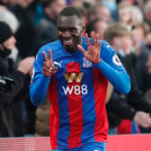  Belgian striker Christian Benteke celebrates after scoring their first goal during the English Premier League  (Photo by FRANK AUGSTEIN/POOL/AFP via Getty Images)