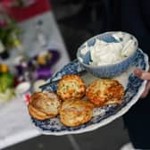 Scones and cream is served at the Melbourne Street Party celebrating the Queens' Platinum Jubilee on June 05, 2022
