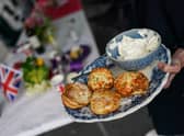 Scones and cream is served at the Melbourne Street Party celebrating the Queens' Platinum Jubilee on June 05, 2022