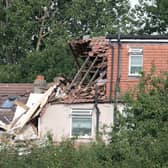 Damage to homes caused by suspected gas explosion that demolished a home yesterday killing a four-year-old girl in Thornton Heath. Credit: SWNS